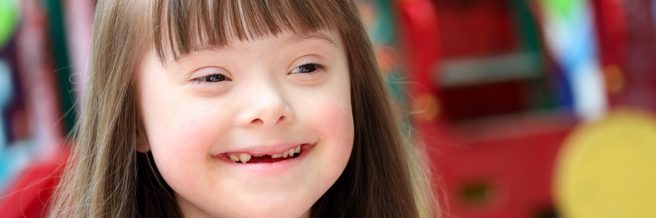 Smiling school children of all ages.