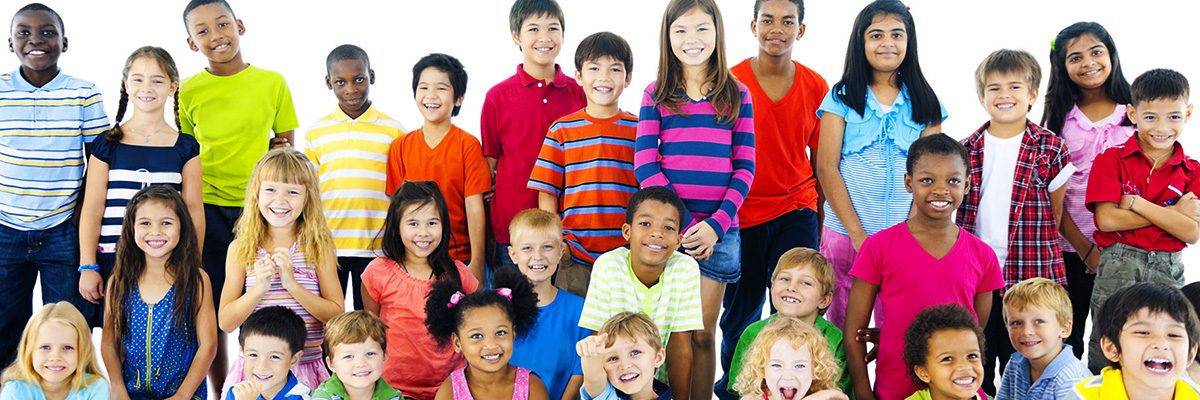 Smiling school children of all ages.